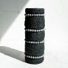 Textured Black Concrete Cylinder Vase with Grey Picture Jasp | Vases & Vessels by Carolyn Powers Designs. Item made of concrete with glass works with minimalism & contemporary style