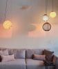 Knitted Pendant Light - Falling 50cm | Pendants by Ariel Zuckerman Studio. Item composed of fabric and glass