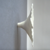 Floral ceramic wall art set of 7 white porcelain flowers | Wall Sculpture in Wall Hangings by Elizabeth Prince Ceramics. Item made of ceramic works with minimalism & contemporary style