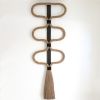 The Element | Macrame Wall Hanging in Wall Hangings by YASHI DESIGNS | Stanly Ranch, Auberge Resorts Collection in Napa. Item composed of oak wood and cotton in contemporary or country & farmhouse style