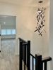 GENESIS for Wendy | Chandeliers by Next Level Lighting. Item composed of wood