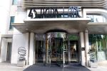 Gold in Black Tall Spiral | Public Sculptures by Mark Beattie MRSS | 45 Park Lane in London. Item made of copper