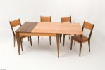 Slide Dining Table | Tables by Zillion Design. Item composed of walnut