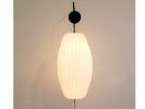 Industrial sconce with pleated LONG OVAL lampshade | Sconces by Studio Pleat. Item made of metal with paper works with mid century modern & contemporary style
