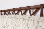 Tindall | Tapestry in Wall Hangings by Keyaiira | leather + fiber | Dr. Michael Cantwell MD in San Francisco. Item composed of walnut & fiber