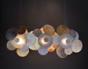 Limpets Bar 3 | Pendants by F+M FOS - Anna Maria Fragiskos Bitros. Item composed of wood and metal