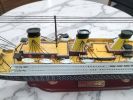 40" Museum-Grade Titanic Wood Model w/ LED & Display Case | Sculptures by Dynasty Artisan. Item made of wood with copper works with eclectic & maximalism & traditional style
