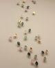 Titled "The Softness," porcelain ceramic petal sculpture | Wall Sculpture in Wall Hangings by Elizabeth Prince Ceramics. Item composed of metal and ceramic in contemporary or japandi style