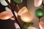 Daydream Under the Penny Vine | Lighting by The Goodman Studio. Item made of glass
