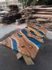 Blue Ocean Epoxy Dining Table | Live Edge Handmade Table | Tables by Tinella Collection. Item made of oak wood compatible with minimalism and art deco style