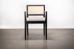 Armchair with Caned Back in Ebonized Wood by Costantini | Chairs by Costantini Design. Item made of wood