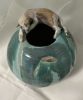 Cat on Green vessel | Sculptures by Sheila Blunt. Item composed of ceramic in contemporary style