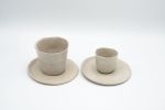Range of tableware in off white. Plates, cups, bowls,... | Dinnerware by Charlotte Ceramics | Private Residence in Ibiza. Item composed of stoneware