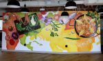 Global Paella Mural for World Central Kitchen | Murals by Marcella Kriebel | WeWork in Washington. Item made of synthetic