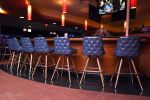 Button Tufted Bar Stools - 7024 | Chairs by Richardson Seating Corporation | 10pin Bowling Lounge in Chicago. Item made of leather