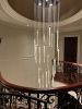 Ferraro Long Staircase Chandelier in hand-blown glass | Chandeliers by Galilee Lighting. Item made of glass