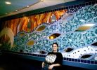 Mosaic Mural - Crescent, River, Fire | Public Mosaics by Gila Mosaics Studio | Smoothie King Center in New Orleans. Item composed of ceramic and glass