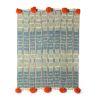 baoule pom pom throw peacock/tangerine poms | Linens & Bedding by Charlie Sprout. Item made of cotton