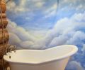 Airbnb Mural: Cloud Sky Mural behind Bathtub | Murals by Devona Stimpson. Item made of synthetic