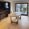 Racetrack Cashmere White Brass Tunnel Table | Dining Table in Tables by YJ Interiors. Item composed of wood & brass compatible with mid century modern and contemporary style