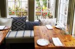 Custom dining tables and cafe tables for restaurant | Tables by Urban Wood Goods | Nantucket Island in Nantucket. Item composed of wood and steel
