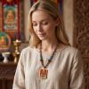 Handcrafted Zha Ji Lhamo Dzambala Thangka Pendant Art | Ornament in Decorative Objects by Dynasty Artisan. Item made of metal works with contemporary & eclectic & maximalism style