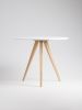 Round white table, dining table, with solid oak legs | Tables by Mo Woodwork