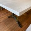 Cotton white bronze wishbone table | Dining Table in Tables by YJ Interiors. Item composed of wood and bronze in mid century modern or contemporary style