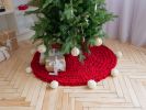 Red knitted Christmas tree skirt | Small Rug in Rugs by Anzy Home. Item made of fabric