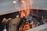 Low, XXL outdoor table with open fire pit. | Picnic Table in Tables by Craft-B. Item composed of wood and metal