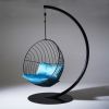 Half Circle Stand with Bubble at WMC Fair | Swing Chair in Chairs by Studio Stirling. Item made of steel works with minimalism & contemporary style