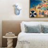 Baby Blue Sculptured Sconces with Glass bubbles | Sconces by Light and Fiber. Item made of steel with glass works with mid century modern & contemporary style