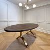 Oval Charcoal Walnut Brass Wishbone Table | Dining Table in Tables by YJ Interiors. Item composed of walnut and brass in mid century modern or contemporary style
