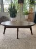 Oval Walnut coffee table | Tables by Kindred Furniture. Item made of walnut & steel compatible with mid century modern and contemporary style