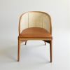Vera Woven Rattan Back Dining Chair | Chairs by Kleinhaus Furniture. Item made of wood with fabric works with boho & mid century modern style