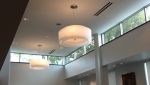 Large Double Shade | Chandeliers by CP Lighting | Mamaroneck Public Library in Mamaroneck. Item composed of synthetic