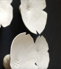 Floral ceramic wall art set of 7 white porcelain flowers | Wall Sculpture in Wall Hangings by Elizabeth Prince Ceramics. Item made of ceramic works with minimalism & contemporary style