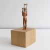"Omino con sedia" (Tiny man with chair) | Sculptures by MARCANTONIO. Item made of wood & bronze
