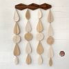 Ceramic wall hanging with decorative wood design | Wall Sculpture in Wall Hangings by Heidi Anderson HASTUDIO. Item composed of wood and ceramic