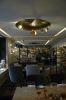 Ovni | Pendants by Ombre Portée | Hotel Sofitel Legend The Grand Amsterdam in Amsterdam. Item composed of brass
