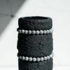 Textured Black Concrete Cylinder Vase with Grey Picture Jasp | Vases & Vessels by Carolyn Powers Designs. Item made of concrete with glass works with minimalism & contemporary style