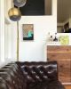 Sunroom | Paintings by Adrian Landon Brooks. Item made of wood & synthetic
