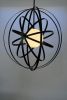 Atlas - A flatpacked Titan | Pendants by ILANEL P/L. Item made of glass