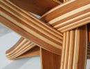 "lock" sculptural caramel and natural bamboo dining table | Tables by JAN PAUL. Item made of bamboo with glass works with mid century modern & contemporary style