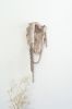 "Afra" Ceramic wall sculpture with chains | Wall Hangings by Asmaa Aman Studio. Item made of ceramic works with boho & contemporary style