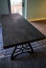 Rustic industrial burnt wood table | Dining Table in Tables by Abodeacious. Item composed of wood