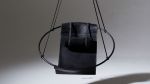 Studio Stirling Thick Leather Sling in Brown | Swing Chair in Chairs by Studio Stirling. Item composed of steel and leather in minimalism or modern style