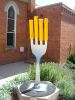"Say Cheese" | Public Sculptures by Justin Deister. Item made of steel with cement