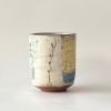 Handmade Tall Tea Cup with Drawings 2 | Drinkware by cursive m ceramics. Item composed of stoneware