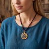 Medicine Buddha Thangka Gold Pendant Vitality Amulet Pedant | Ornament in Decorative Objects by Dynasty Artisan. Item composed of metal compatible with contemporary and eclectic & maximalism style